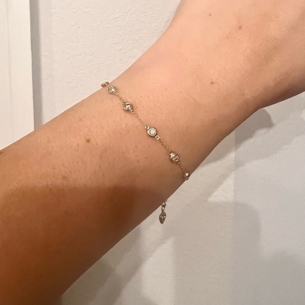 14 karat yellow gold diamond station bracelet